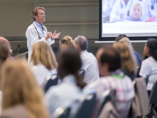Healthcare professional teaching or presenting